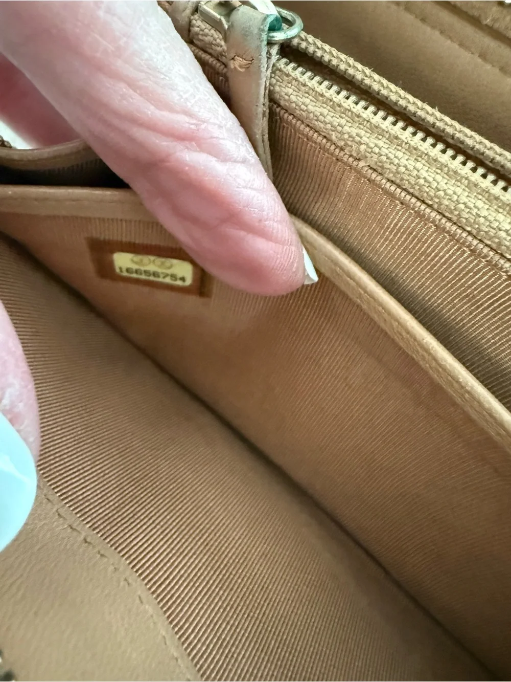 CHANEL Quilted Leather Zip Wallet in Brown with Gold CC